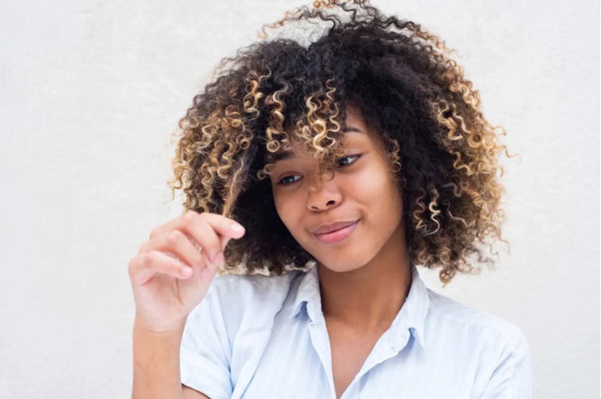 How to Manage Split Ends on Curly Hair: Causes, Prevention, and Repair